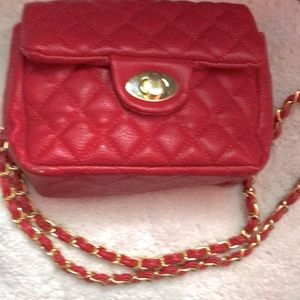 Small red quilted purse